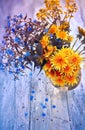 Bouquet with forget-me-not and dandelions Royalty Free Stock Photo