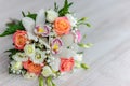 Bouquet of fresh flowers from roses, orchids and white eustoma Royalty Free Stock Photo