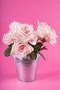 Elegant Romance: Bouquet of Fresh Pink Roses in Retro Metal Flowers Pan (Close-Up) Royalty Free Stock Photo