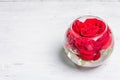 Bouquet of fresh red roses in glass vase Royalty Free Stock Photo