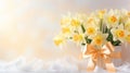 bouquet of fresh yellow narcissus, daffodil flowers tied with a ribbon on a light background. Greeting card with space for text