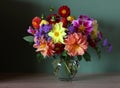 Bouquet of garden dahlias, flowers in a glass vase Royalty Free Stock Photo