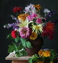 Bouquet of garden flowers in a jug. Royalty Free Stock Photo