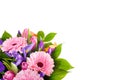 Bouquet of gerberas, irises and tulips on a white background