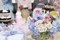 Bouquet And Gifts On Table At A Baby Shower