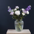 Bouquet of hackelia velutina, purple and white roses