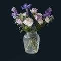 Bouquet of hackelia velutina, purple and white roses, small tea roses, matthiola incana in glass vase isolated on black background Royalty Free Stock Photo