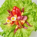 Bouquet with ingredients for healthy nutririon or diet. Lettuce with eggs and fresh vegetables closeup