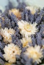 Bouquet of lavender and dry flowers. Colorful summer bunch of purple lavender and yellow chamomile flowers.