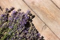 Bouquet of lavender flowers on a wooden background. Lots of fragrant summer flowers. Copy space Royalty Free Stock Photo