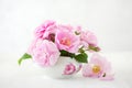 Bouquet of light pink roses on light grey background