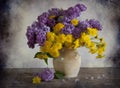Bouquet of lilac and dandelions