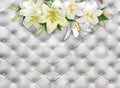 Bouquet of lilies on a background of white leather. Photo wallpaper. 3D rendering