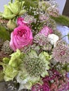 Bouquet of mixed colorful flowers. Flowers bouquet including pink roses, astrantia, white and green flowers. Beautiful bright Royalty Free Stock Photo