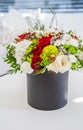 Bouquet of multicolored flowers roses in luxury gift box Royalty Free Stock Photo