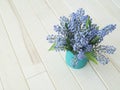 A bouquet of Muscari. Wooden background. The view from the top. Royalty Free Stock Photo