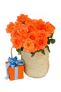 Bouquet of orange roses in basket Royalty Free Stock Photo