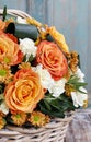 Bouquet of orange roses and ivory carnation flowers Royalty Free Stock Photo