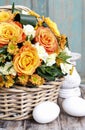 Bouquet of orange roses and ivory carnation flowers Royalty Free Stock Photo