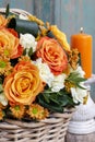 Bouquet of orange roses and ivory carnation flowers Royalty Free Stock Photo