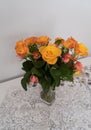 Bouquet of orange roses in a vase Royalty Free Stock Photo