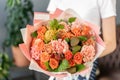 Bouquet Peach and orange color. beautiful hydrangea flowers in a vase on a table . Decoration of home. Wallpaper and