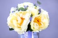 Bouquet of peonies and forget-me-nots on a lilac background. Bridal bouquet. The background color is very peri