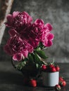 A bouquet of peonies in a vintage vase. Royalty Free Stock Photo