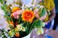 Bouquet of peony roses and tulips on the table in a vase Royalty Free Stock Photo