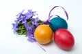 Bouquet periwinkle flower Vinca minor and three painted easter eggs
