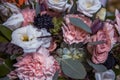 Bouquet with pink carnations and other flowers and green leaves Royalty Free Stock Photo