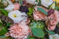 Bouquet with pink carnations and other flowers and green leaves Royalty Free Stock Photo