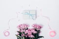 Bouquet of pink flowers, blue gift box Royalty Free Stock Photo
