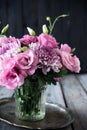 Bouquet of pink flowers in vase vintage decor Royalty Free Stock Photo