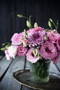 Bouquet of pink flowers in vase vintage decor Royalty Free Stock Photo