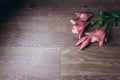 Bouquet of pink lily flowers in the rays of light on a wooden rustic table. fresh buds of a flowering plant close-up, copy space, Royalty Free Stock Photo