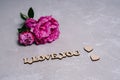 Happy Valentine's Day. A bouquet of pink peonies and a wooden inscription I love you. Royalty Free Stock Photo