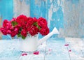 Bouquet of pink roses in white watering can Royalty Free Stock Photo