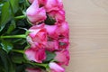 Bouquet of pink roses on wooden background.St Valentine`s Day,Mother`s Day or Happy Birthday concept with copy space. Royalty Free Stock Photo