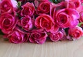 Bouquet of pink roses on wooden background.St Valentine`s Day,Mother`s Day or Happy Birthday concept with copy space. Royalty Free Stock Photo