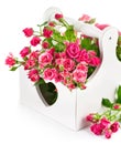 Bouquet pink roses in wooden basket Royalty Free Stock Photo