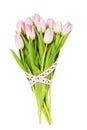 Bouquet of pink tulips decorated with ribbon isolated over white. Valentines Day concept