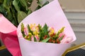 Bouquet of pink tulips wrappen in pink paper Royalty Free Stock Photo