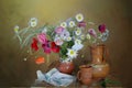 Bouquet of poppies, daisies and ceramics on the table. Still life with wild flowers