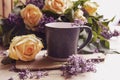 Bouquet Of Purple Lilacs With Yellow Roses. Gray Cup Of Coffee.