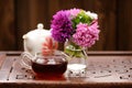 Bouquet of purple and pink asters and teaware for chinese tea ce Royalty Free Stock Photo