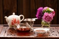 Bouquet of purple and pink asters and teaware for chinese tea ce Royalty Free Stock Photo