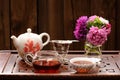 Bouquet of purple and pink asters and teaware for chinese tea ce Royalty Free Stock Photo