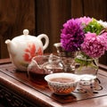 Bouquet of purple and pink asters and teaware for chinese tea ce Royalty Free Stock Photo