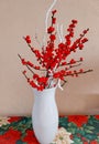 Bouquet of red berries in a vase. Royalty Free Stock Photo